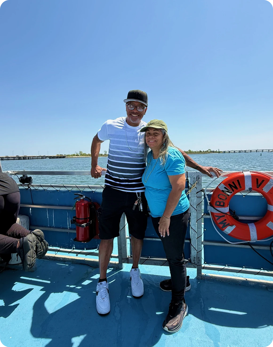 Happy pair enjoying a day at sea