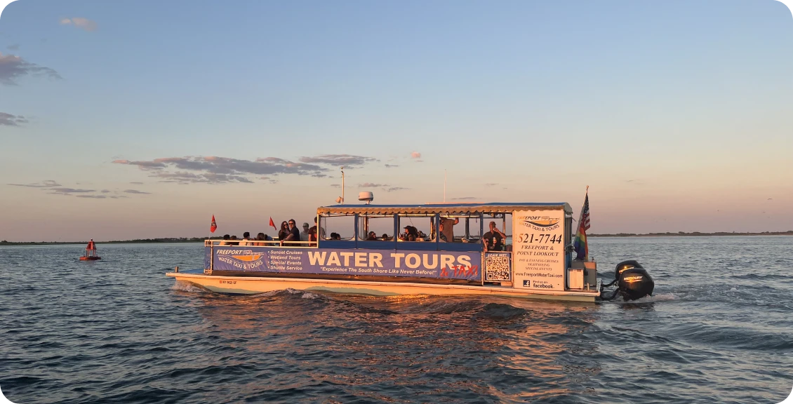 Boat cruising during golden hour.