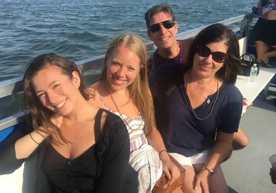 Friends smiling on a boat trip